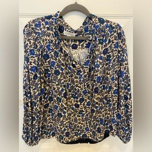 Pretty blue floral blouse. Just in time for spring. Excellent quality.